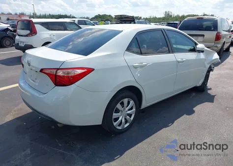 2018 Toyota Corolla из США, поврежденный, VIN 5YFEURHE9JE748464
